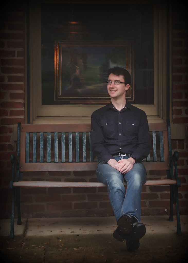 photo of website author seated on bench